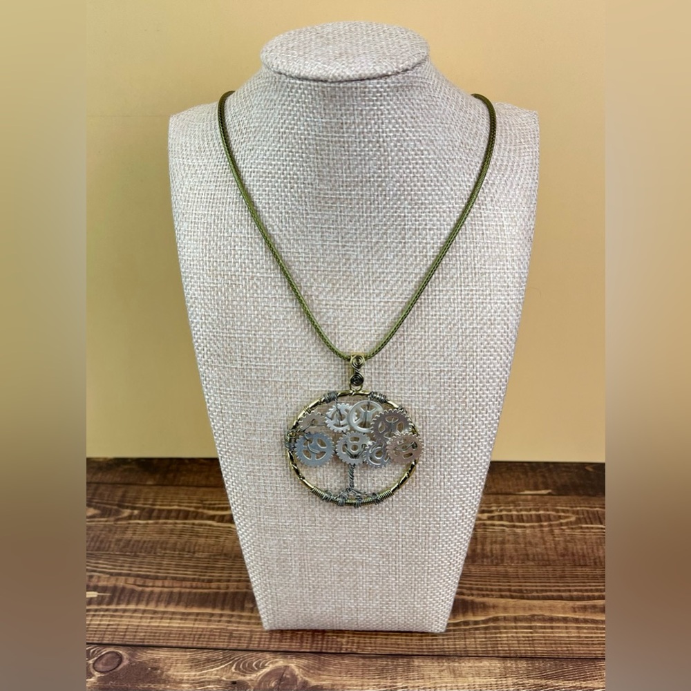 The Chronos Arbor Pendant Necklace
“Where Nature Meets the Machine”